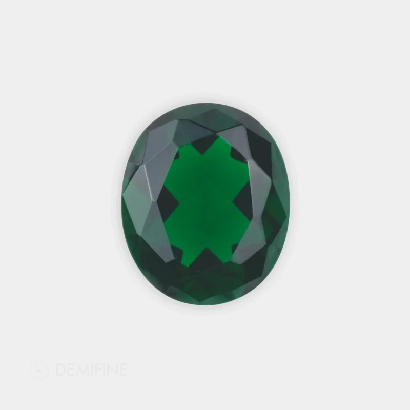 vidrio oval facetado color esmeralda oscuro